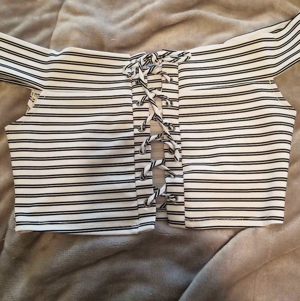 Off the shoulder cropped shirt.